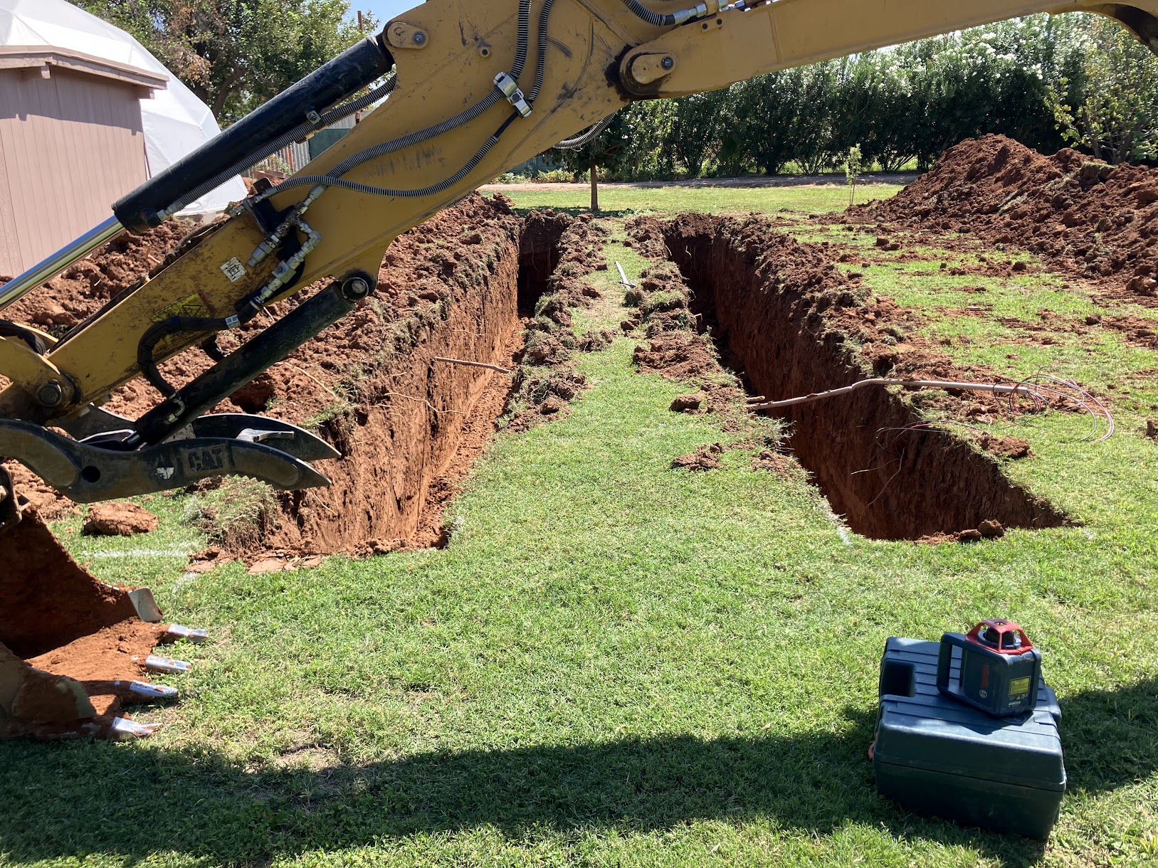 Drain field trenches excavated for chamber installation in Gilbert AZ